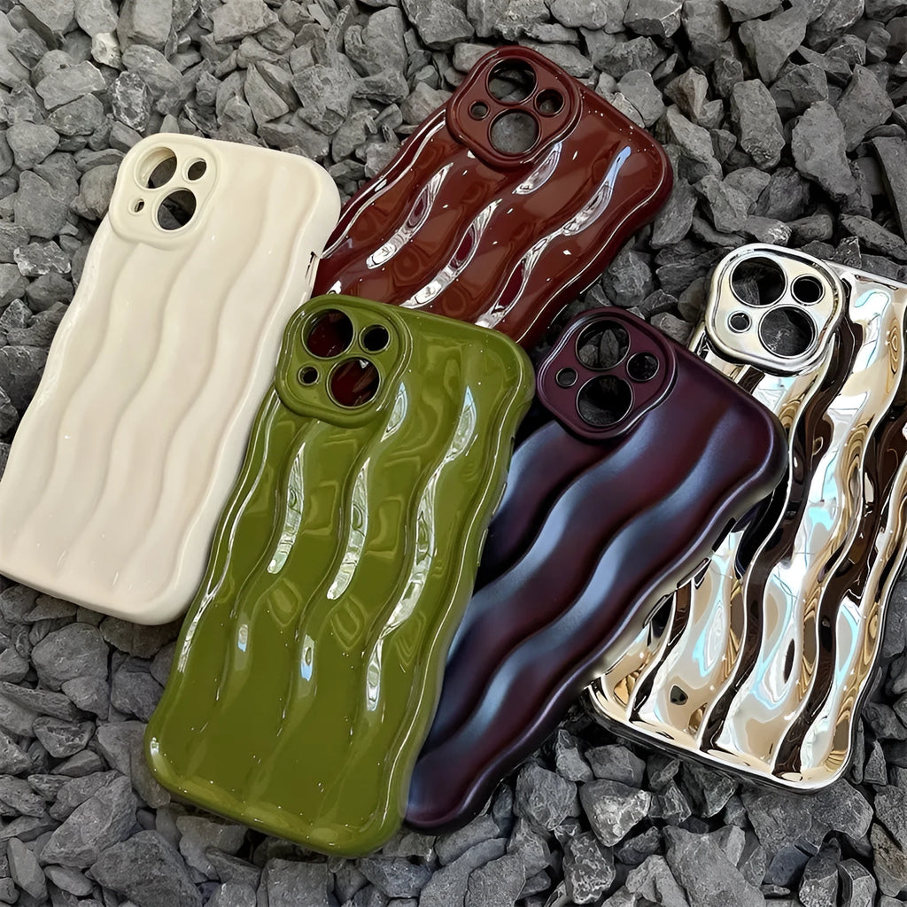 Silicone iPhone 17 case with water ripple texture in green, showing form-fitting design and protective edges.