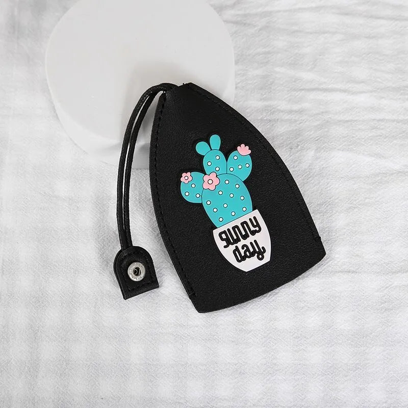 Cartoon PU leather pull-out car key case measuring 14 x 7.5cm with colourful designs