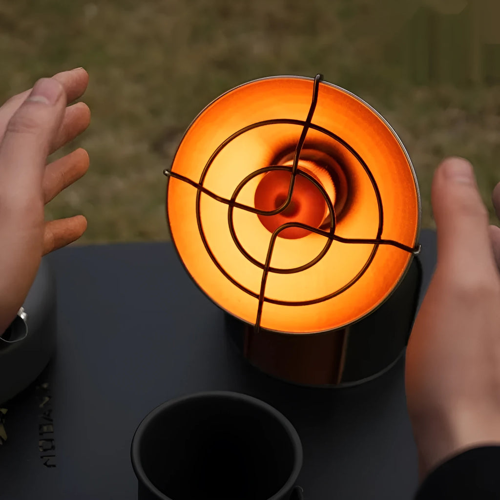 Black and orange portable camping heating stove with automatic ignition, stainless steel construction