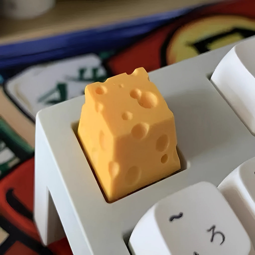 Resin cheese key cap for mechanical keyboards with yellow decorative cheese wedge design