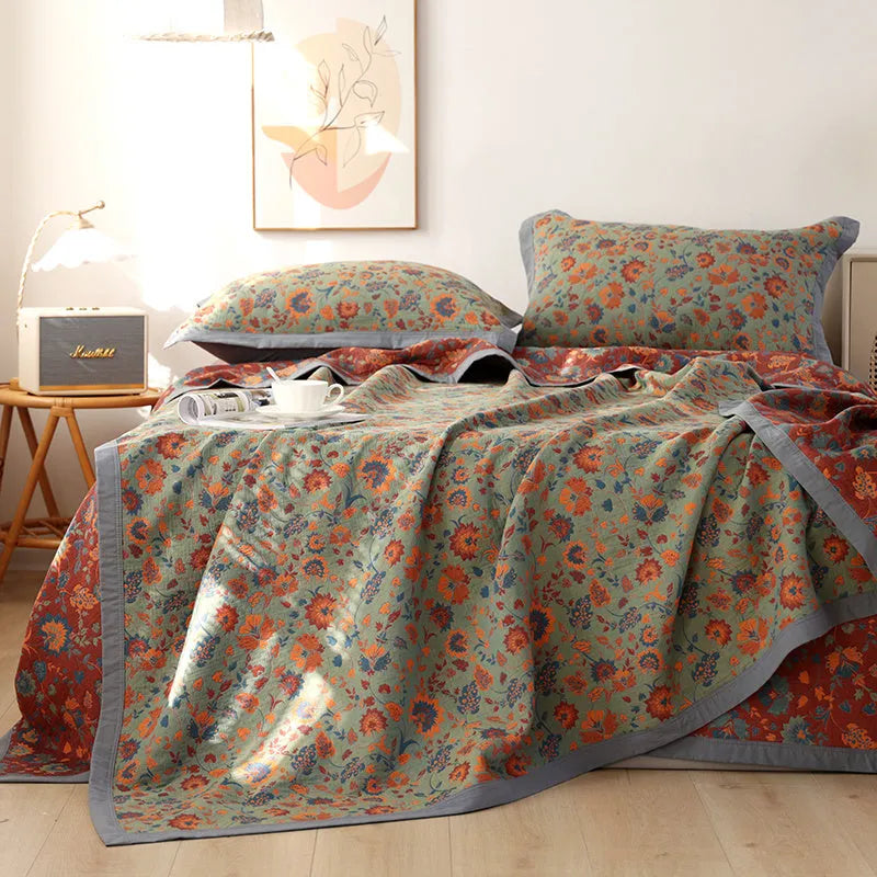 Cotton gauze bed blanket three-piece set with plants and flowers pattern showing blanket and matching pillowcases
