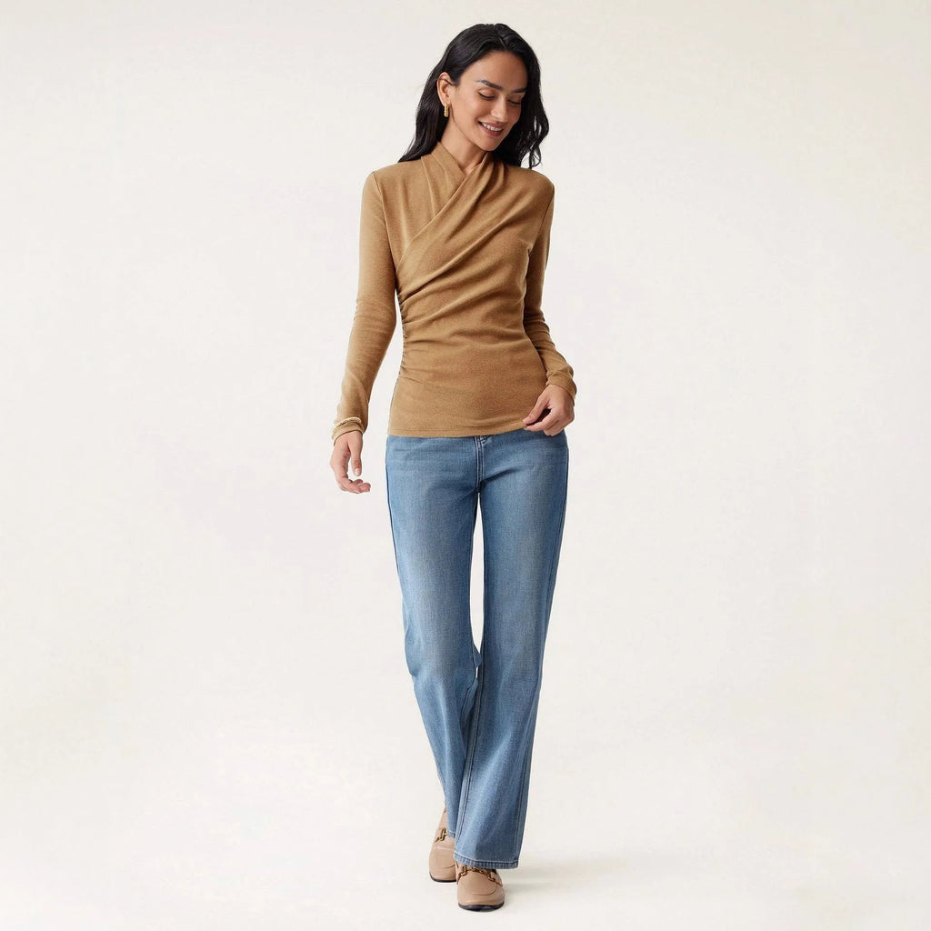 Camel-coloured women's slim-fit polyester pullover sweater on a hanger.