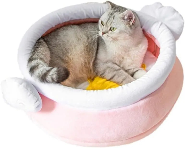 Pink honey pot-shaped cat sofa bed with a soft, removable grey nest pad inside.