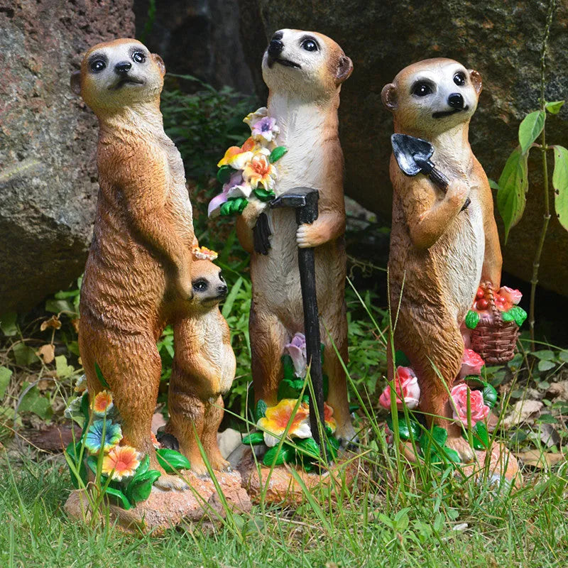 Straw hat mongoose garden ornaments in resin with rake and shovel designs
