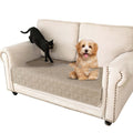 Reversible waterproof dog sofa cushion in dark grey and light grey, shown on a sofa.