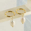 Geometric gold earrings with freshwater pearls on stainless steel posts