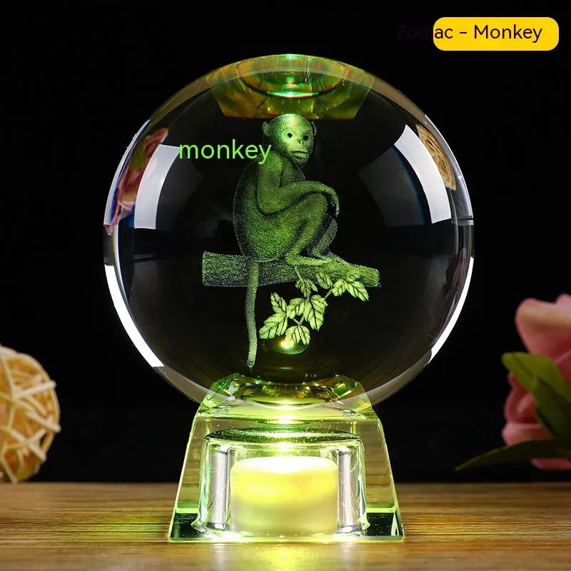 White crystal zodiac ornament with electronic luminous base showing Chinese animal design