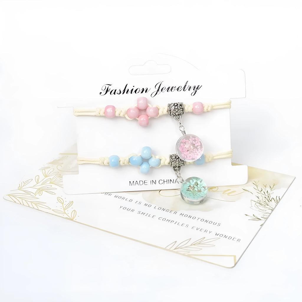 Women's hand-woven glass bracelet with large 1.4cm beads containing dried flowers, shown in blue colour option
