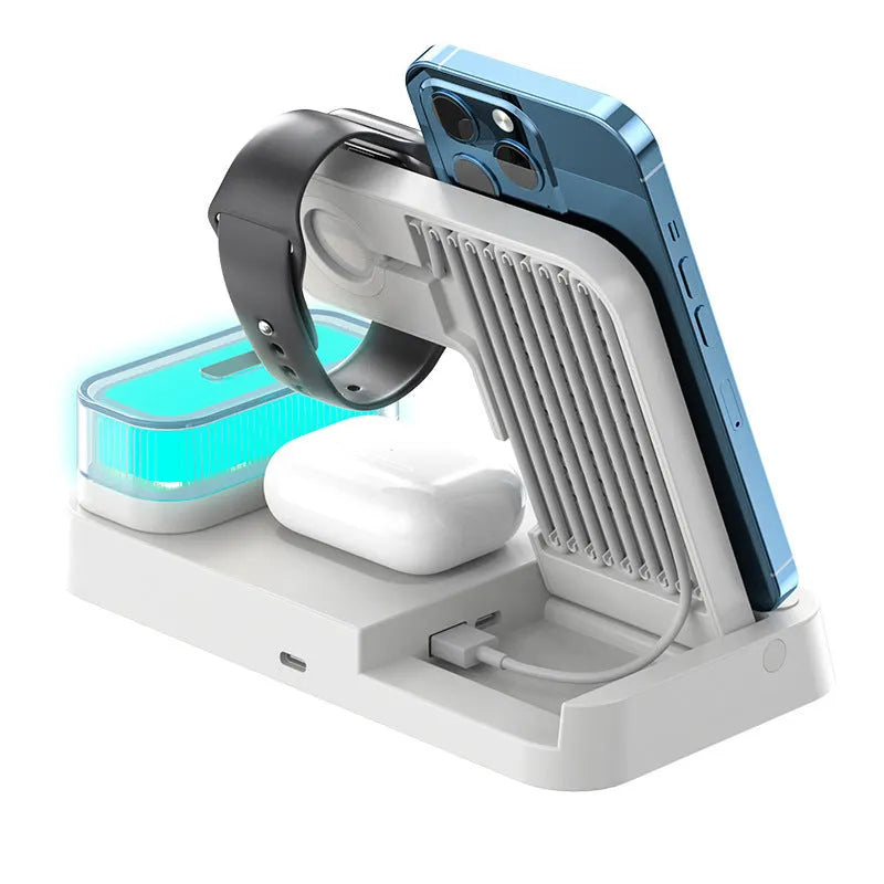White 4-in-1 wireless charging station showing alarm clock display, foldable stand, and charging pads for phone and Apple Watch.