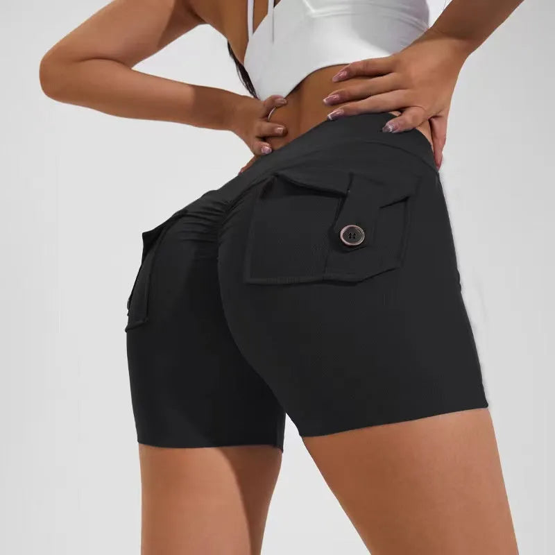 Women's high-waist fitness shorts in quick-dry nylon with side pockets, shown in Electric Blue.