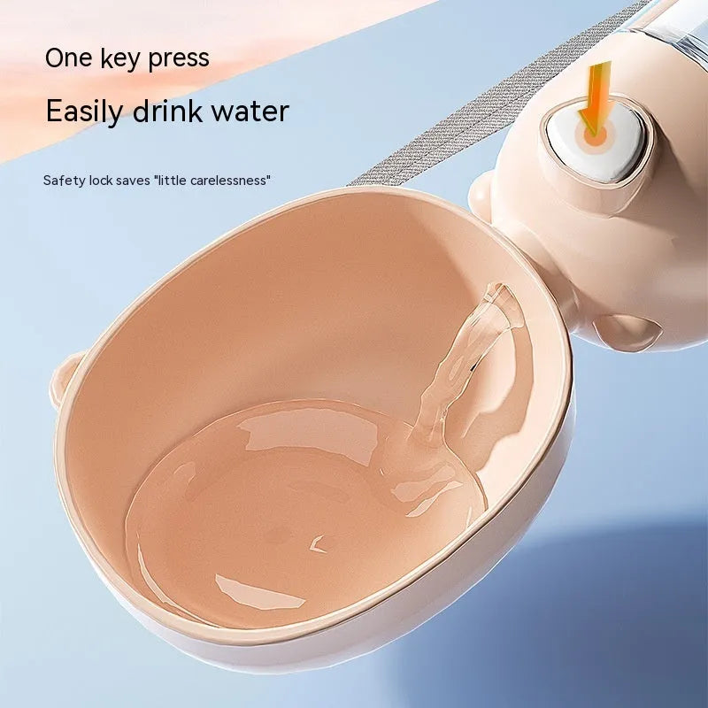 Portable dog water bottle with fold-out feeding bowl in brown colour for outdoor travel