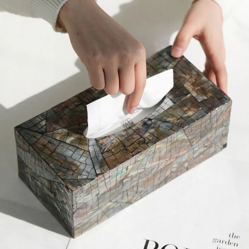 Black square and rectangular natural shell tissue boxes with removable storage organisers.