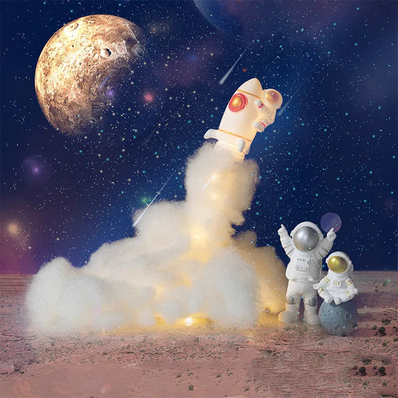 DIY astronaut rocket LED night light kit components including model, string lights, straws, and chassis.