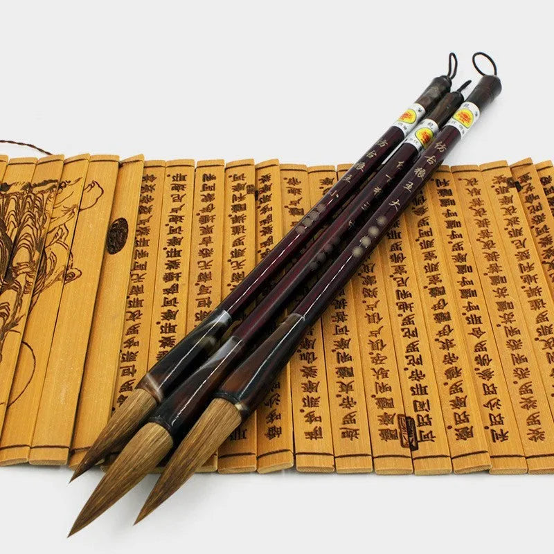 Traditional Chinese wolf hair calligraphy brush with steel rod, styles include large, medium, and trumpet.