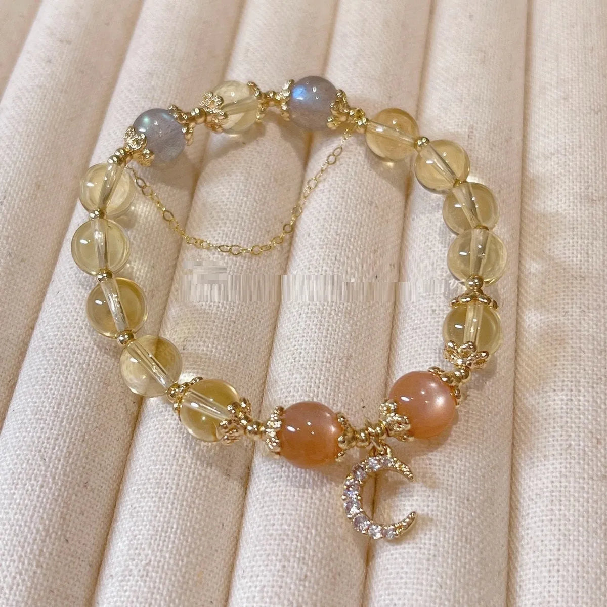 Chinese style women's crystal bracelet with moonstone golden sun stone design and gold electroplating