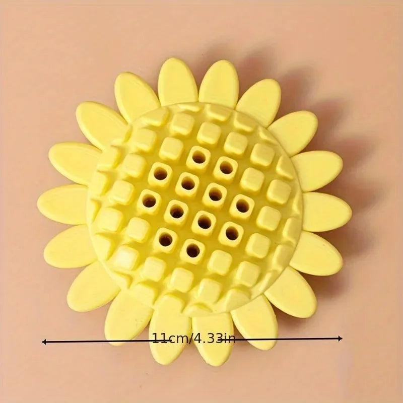 Yellow rubber sunflower dog toy for puppies and dogs, a chewy pet accessory for teething and play.