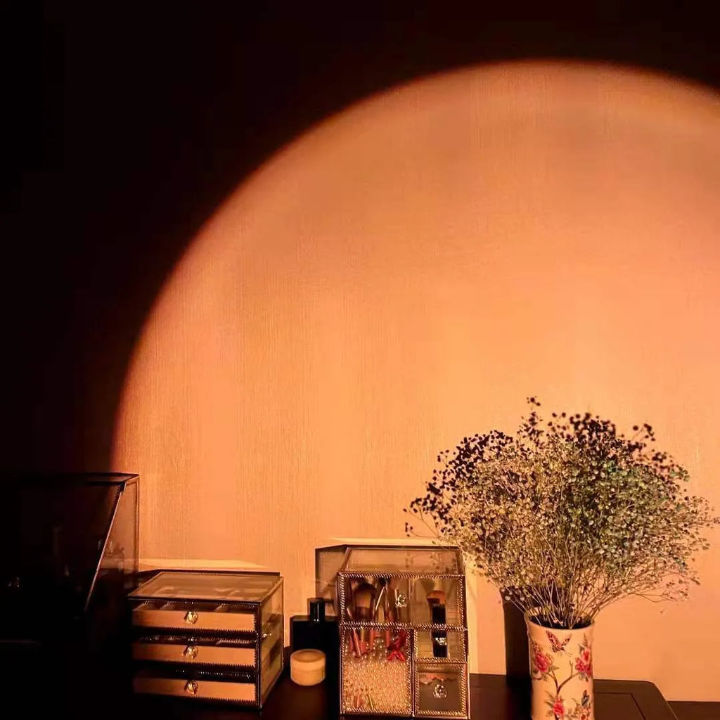 Rechargeable sunset projection lamp showing rainbow and red light patterns