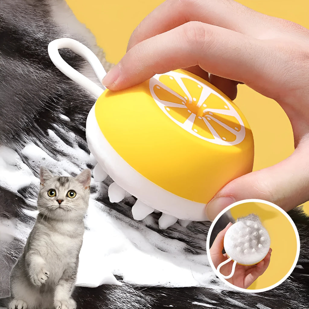 Yellow silicone pet bath brush with interchangeable heads for dog and cat grooming during washing