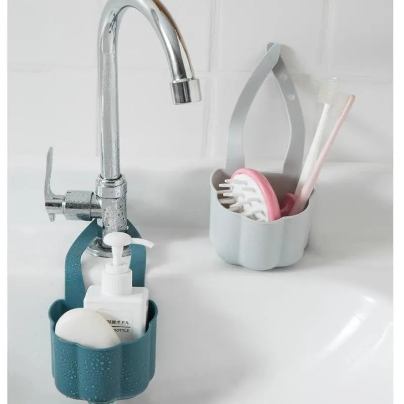 Nordic-style plastic sink drain basket in dark blue colour with water drainage slots