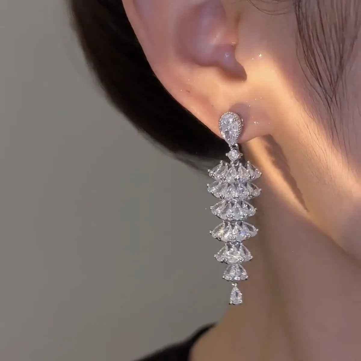 Silver pagoda coloured drop earrings with a sparkling zircon Christmas tree design on copper studs.