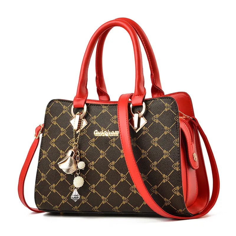 Women's geometric pattern PU leather messenger bag with zipper closure showing internal card slots and phone pocket.