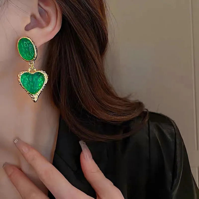 Alloy pleated oval love heart stud earrings with silver needle detailing in multiple colour options