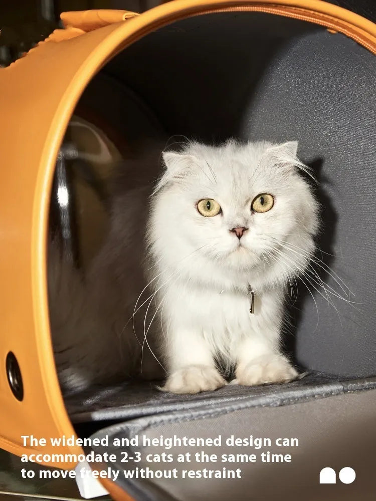 Portable pet carrier bag for cats and small dogs, shown in elk orange colour with shoulder strap.