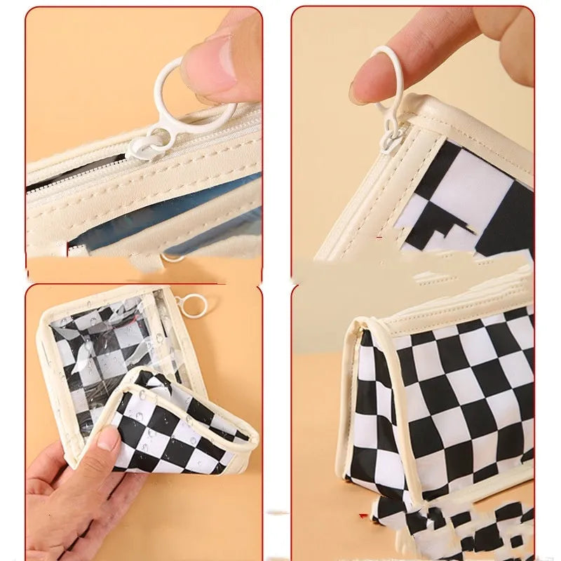 Transparent PVC pencil case with chessboard grid design showing pens inside, black and white plaid pattern