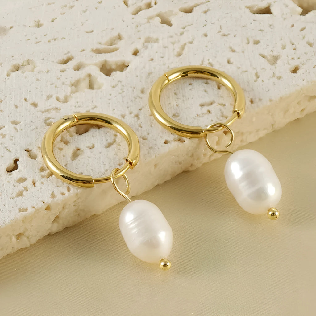 Geometric gold earrings with freshwater pearls on stainless steel posts