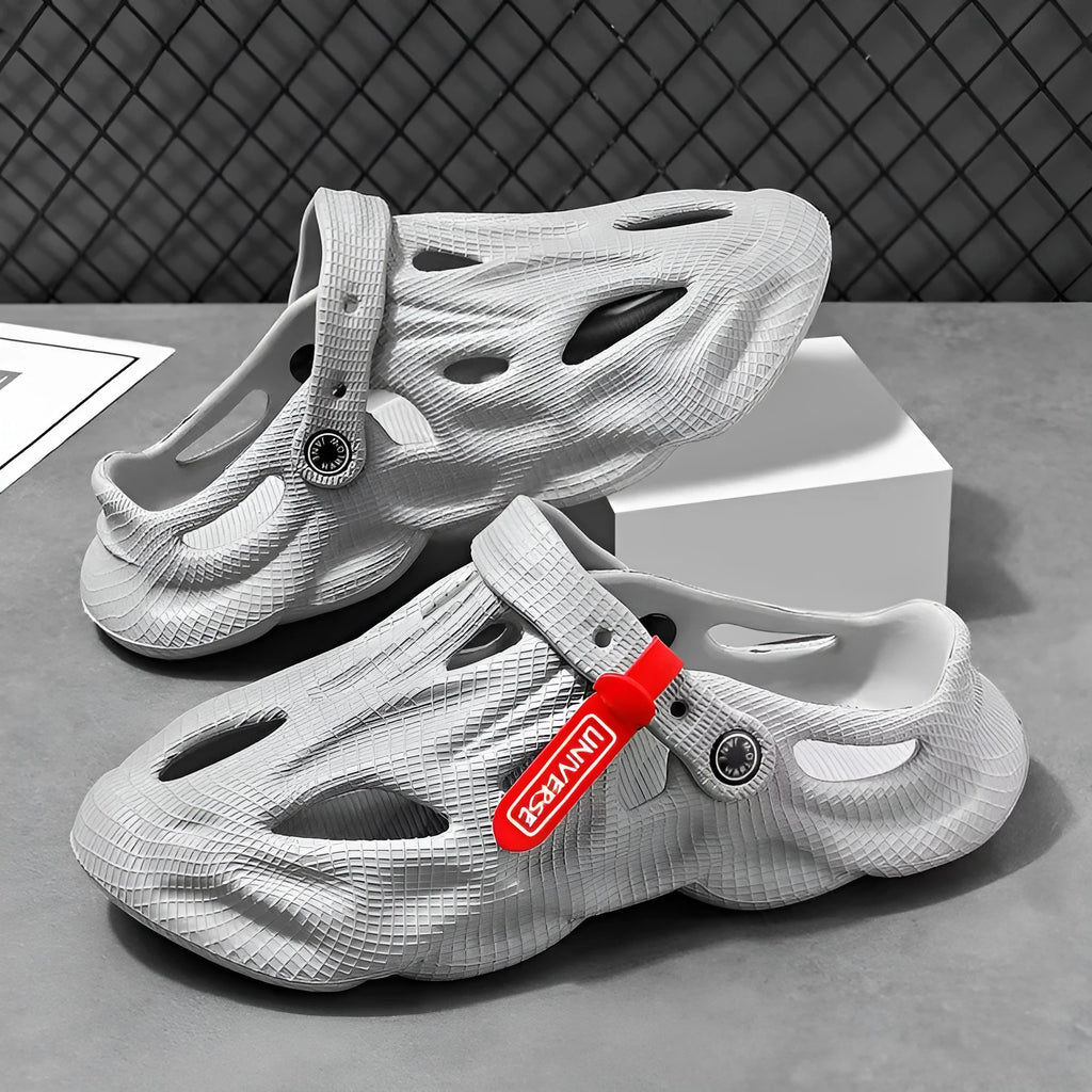 Pair of solid colour closed-toe EVA foam slippers on a neutral background, showing the frosted finish and thickened sole.