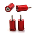 Aluminium engine cover spacers in black, blue, and red colours with installation hardware