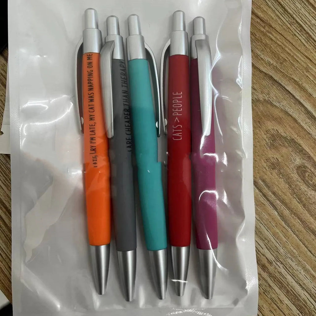Five automatic push-action pens with cat and dog design refills in a beaded pouch