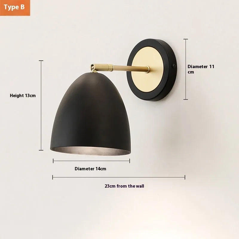 Nordic style iron wall lamp mounted beside a bed, showcasing its metal construction and adjustable light settings.