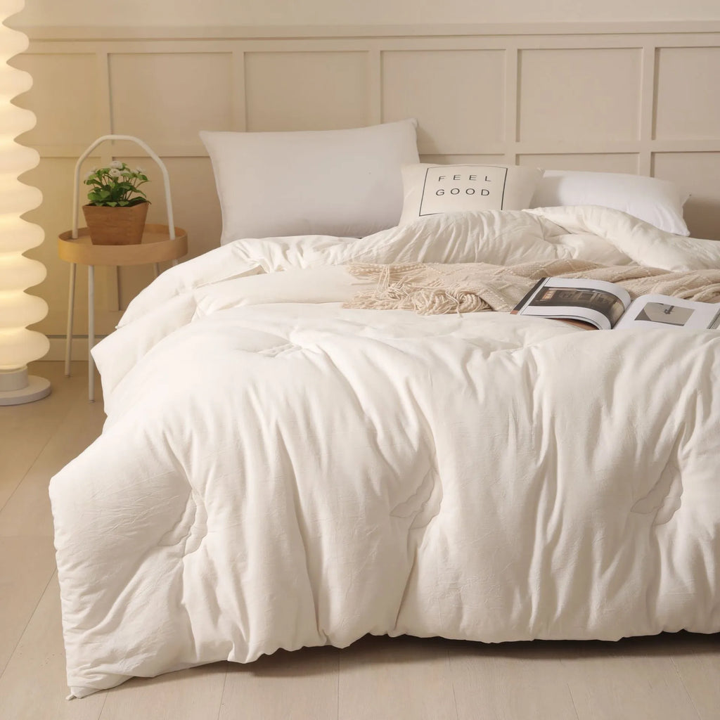 Soybean fibre quilt with pure cotton cover in white, grey, or pink jade, shown in various sizes on a bed.