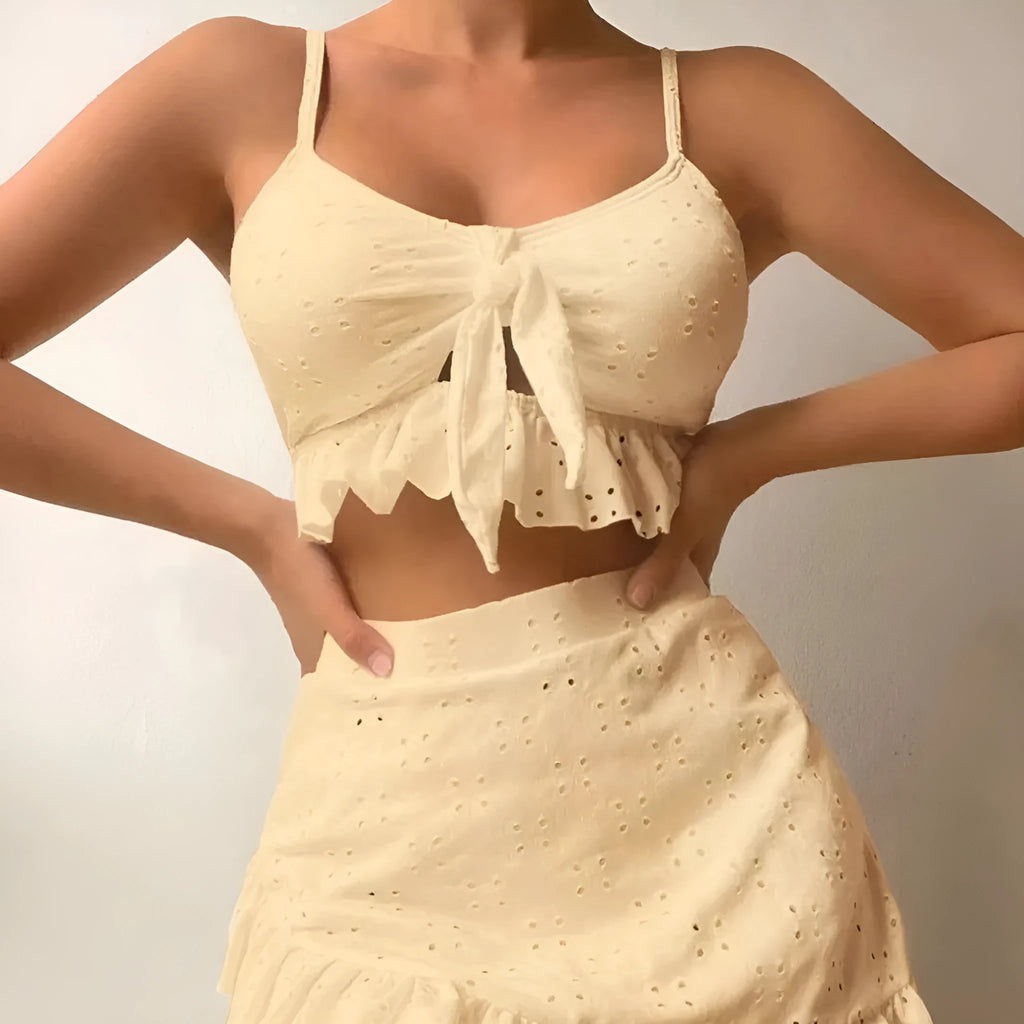 Women's three-piece bikini swimsuit with split hip skirt in polyester fabric