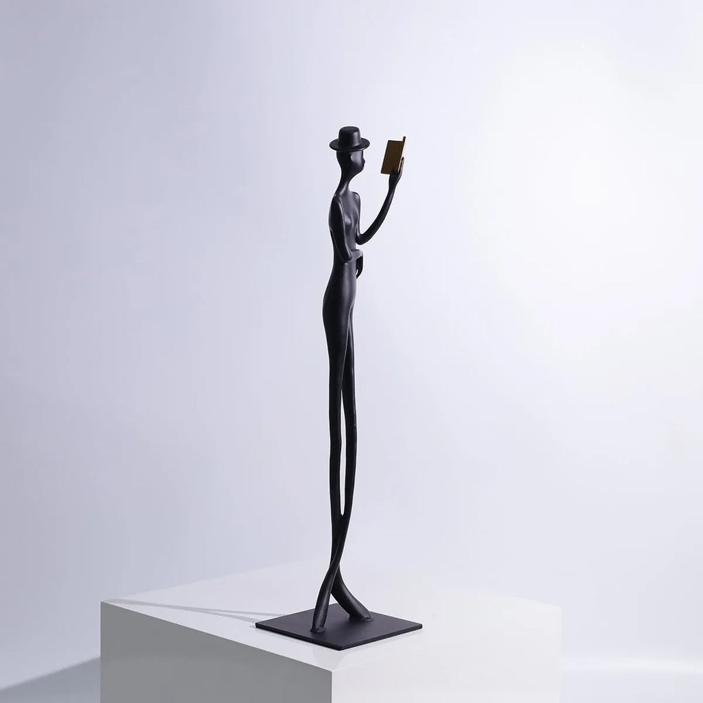 Black cast aluminium reading woman desktop sculpture modern minimalist decor