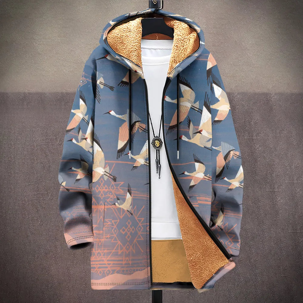 Man wearing a loose fit hooded cardigan with a front zipper and digital multicolour print pattern.