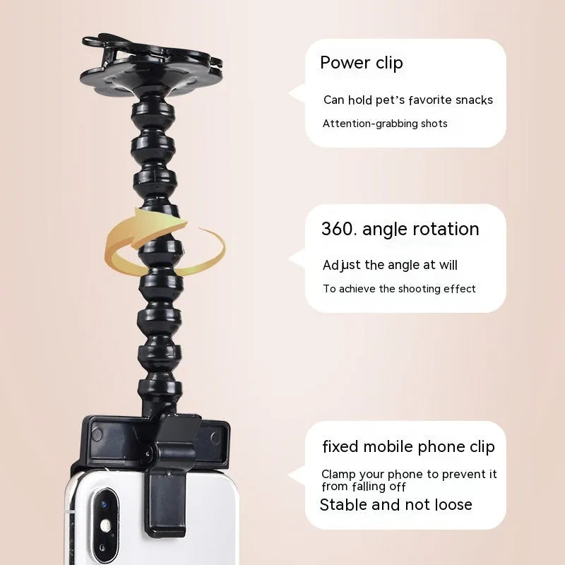 Black plastic pet photography tool with rotating clip for mobile phone attachment
