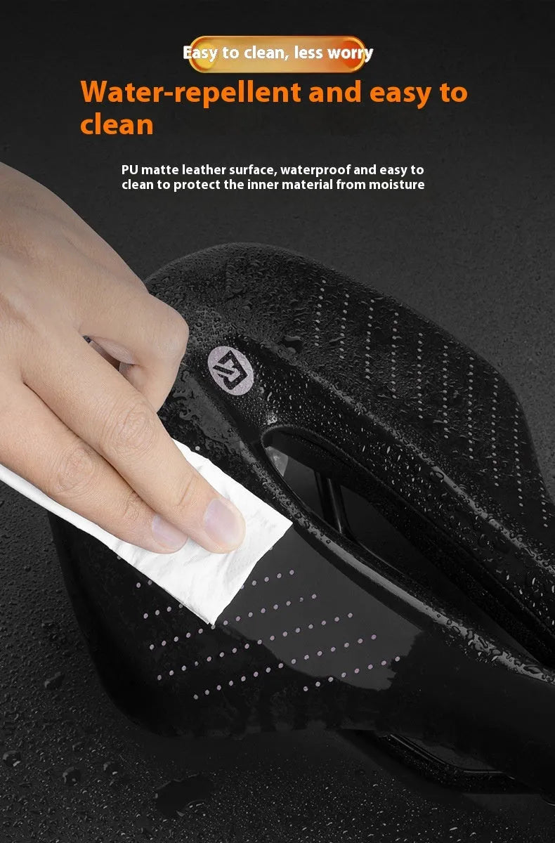 Medium mountain bike seat cushion in black and pink made from PU foam resin sponge