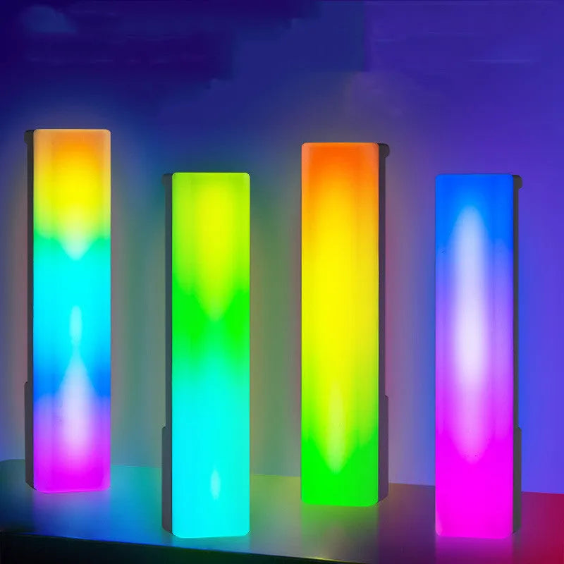 3D RGB music rhythm ambiance lamp in black or white shell on a tabletop.