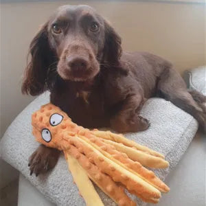 Blue octopus-shaped dog plush toy with squeaker and crinkle sounds, measuring 32 cm long.