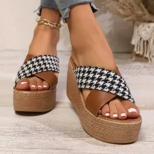 Brown plaid wedge sandals with cross leopard print and a black rubber sticky sole.