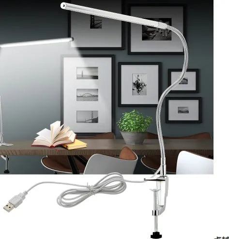 Silver LED clip-on table lamp with long adjustable arm for nail lighting and detailed work