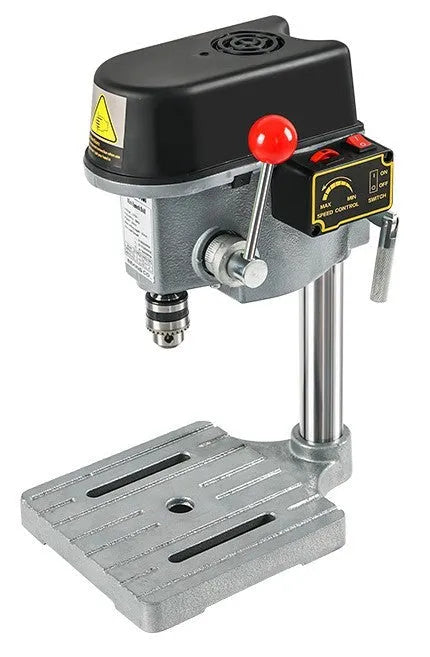 1050W mini bench drilling machine with cross bench pliers on workbench