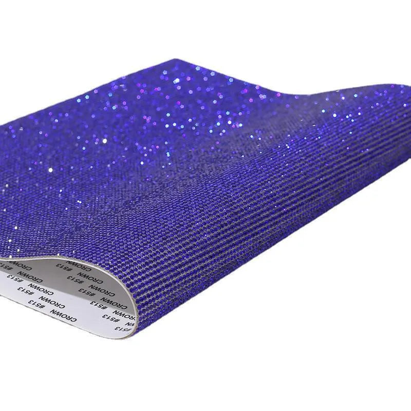 Rhinestone sticker sheet in eight eyes pattern showing electroplated crystals on adhesive backing