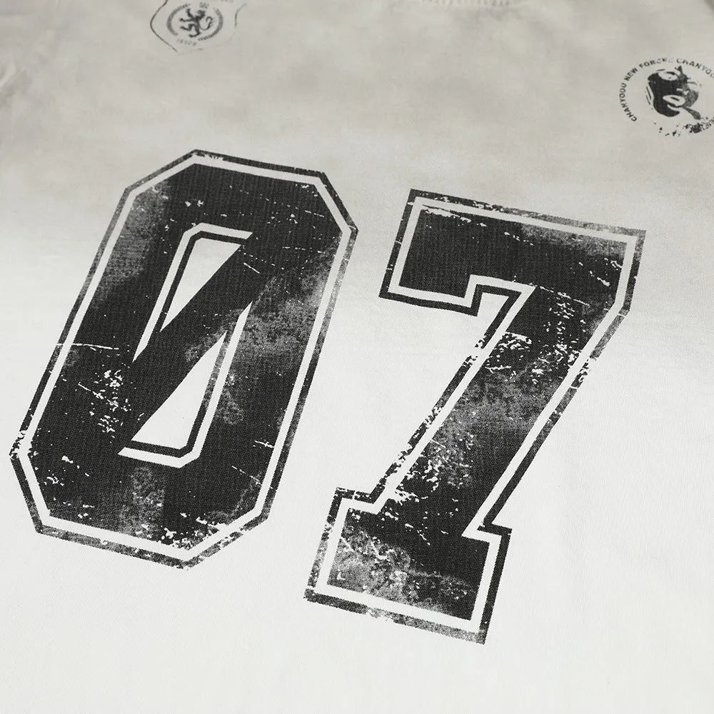 Men's black and white pure cotton printed short-sleeve t-shirt laid flat.