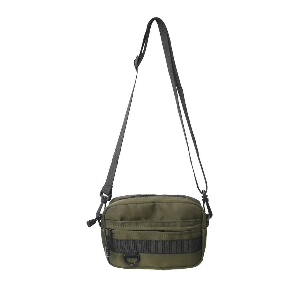 Men's street style nylon messenger crossbody bag in black showing 22cm length and sewing thread detailing