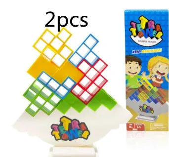 Plastic balance stacking board game with colourful blocks, chassis, and base on table
