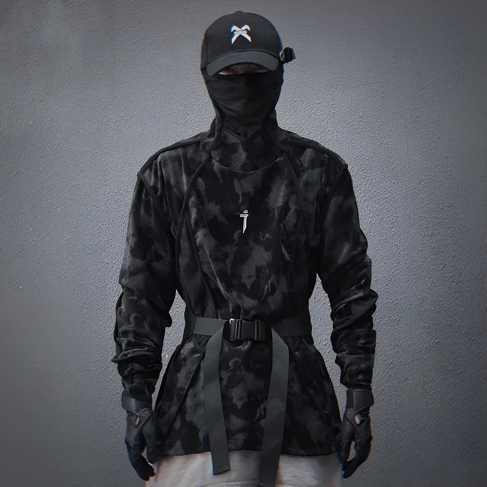 Men's black tie dye printed sweater with a finger turtleneck collar and loose drop-shoulder sleeves.