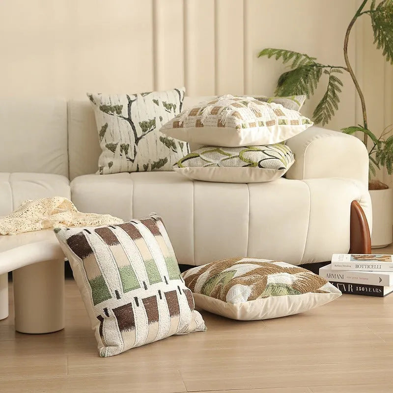 Square pillow cover with woven plant pattern in Nordic style, shown on a sofa as a waist pillow.